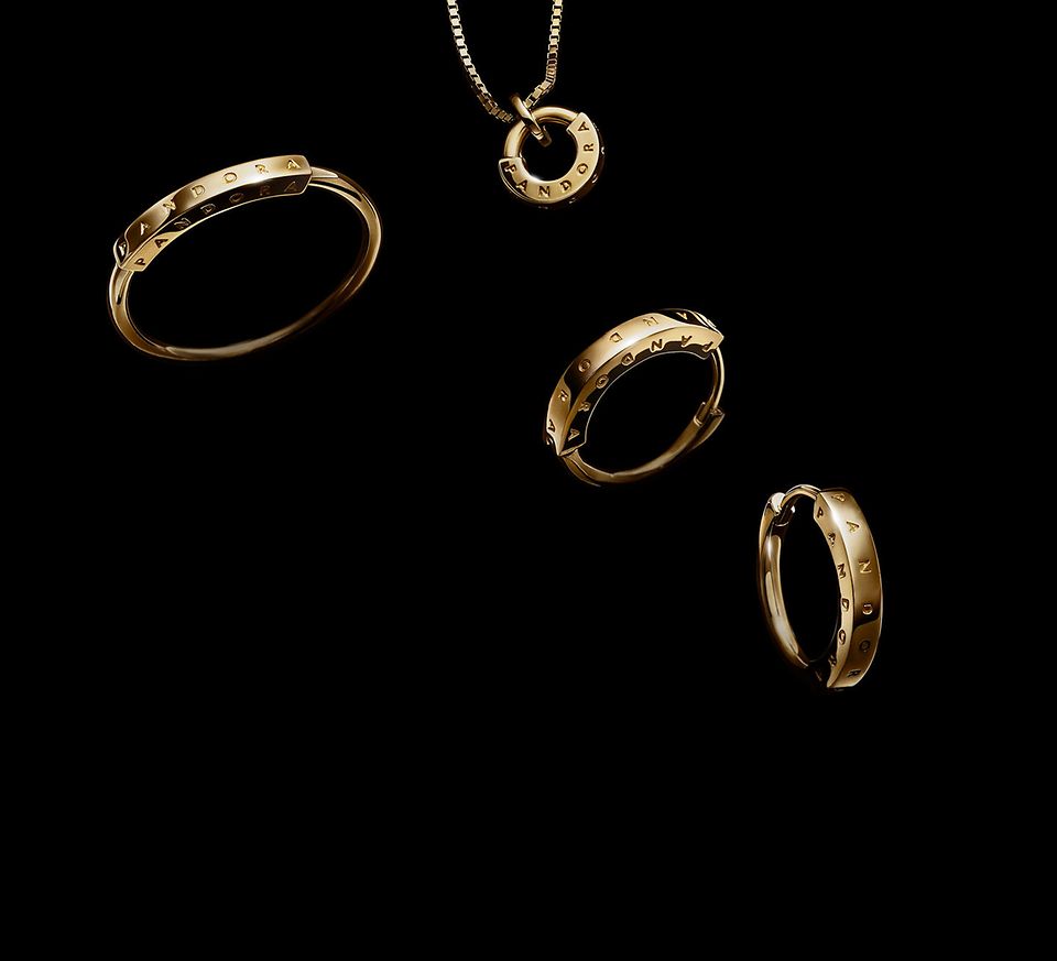 Pandora Signature necklaces, earrings and rings in 14k solid gold.