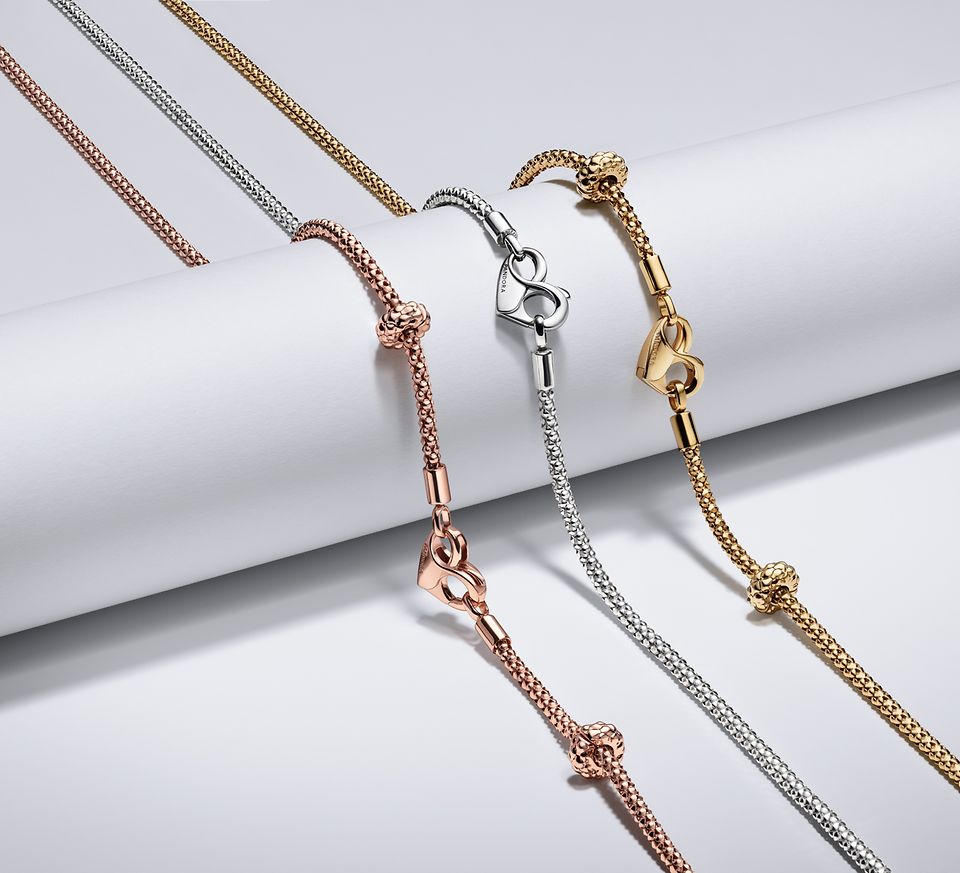 Image of 3 pandora moments studded chains which are silver, gold and rose gold