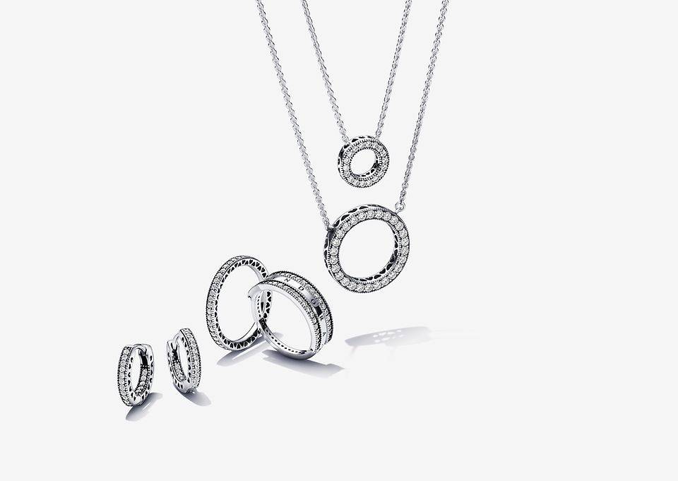 Image of silver necklaces, rings, and earrings from Pandora’s Signature range.