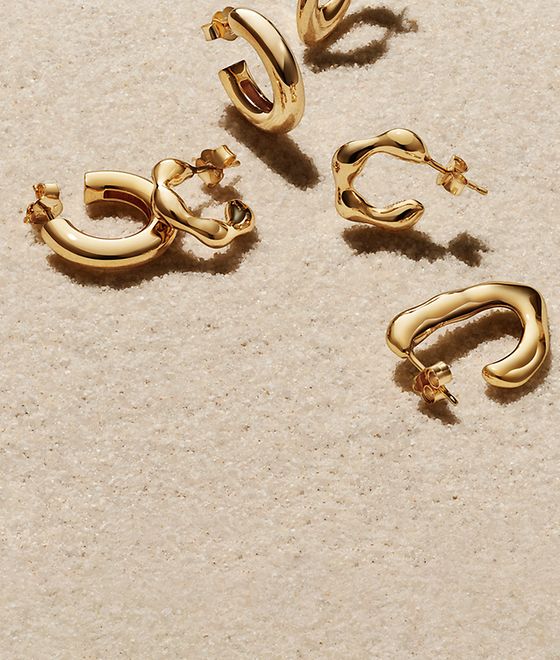 Pandora essence gold hoops earrings.